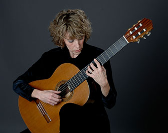 Cindy Egger playing classical guitar